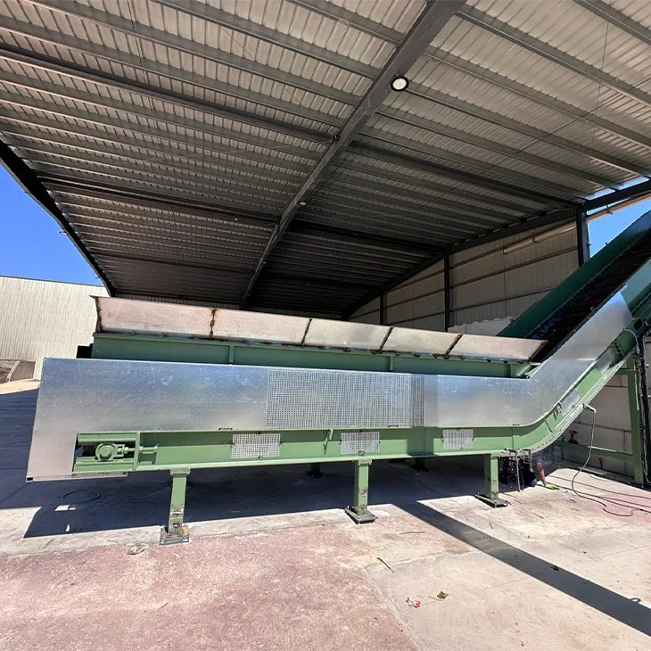 Side detail of a large screening line at a garbage sorting plant